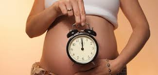 embarazada y reloj